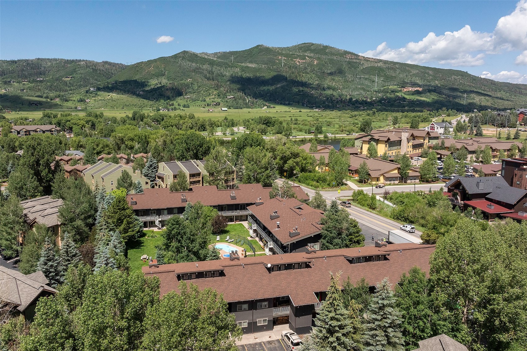 1355 Walton Creek Road, Unit 21 Steamboat Springs, CO 80487 - Photo 7 of 27 an aerial view of residential houses with outdoor space and river