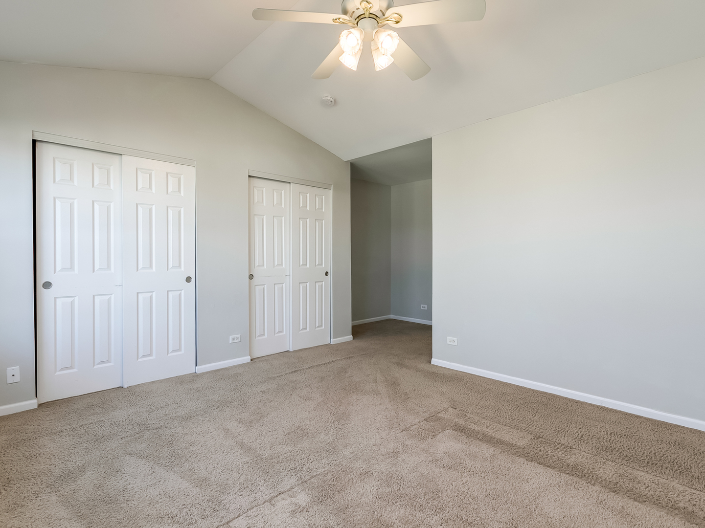 2331 Overlook Court Naperville, IL 60563 - Photo 16 of 27 an empty room with windows and fan