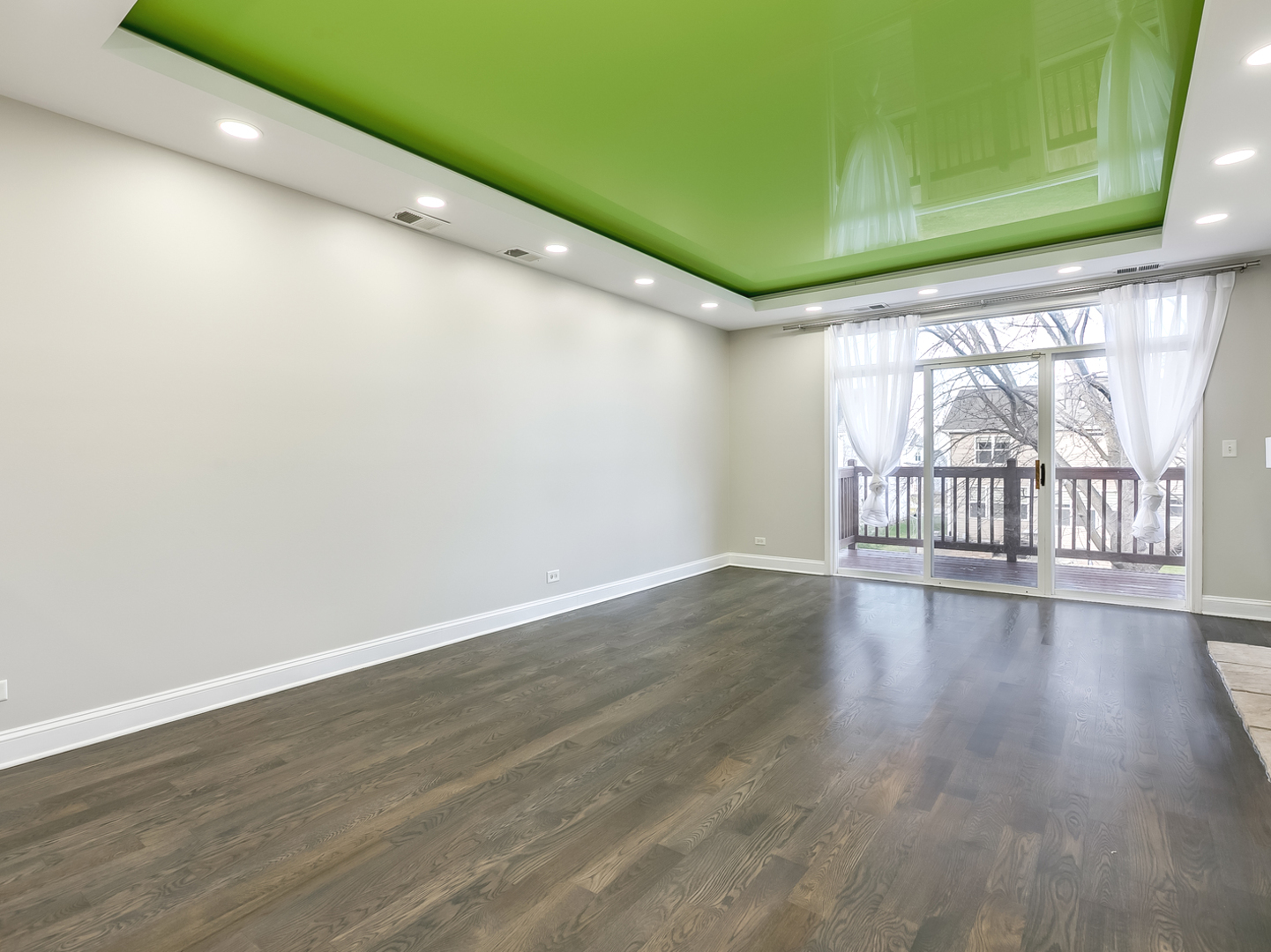 2331 Overlook Court Naperville, IL 60563 - Photo 2 of 27 a view of an empty room with wooden floor and a window
