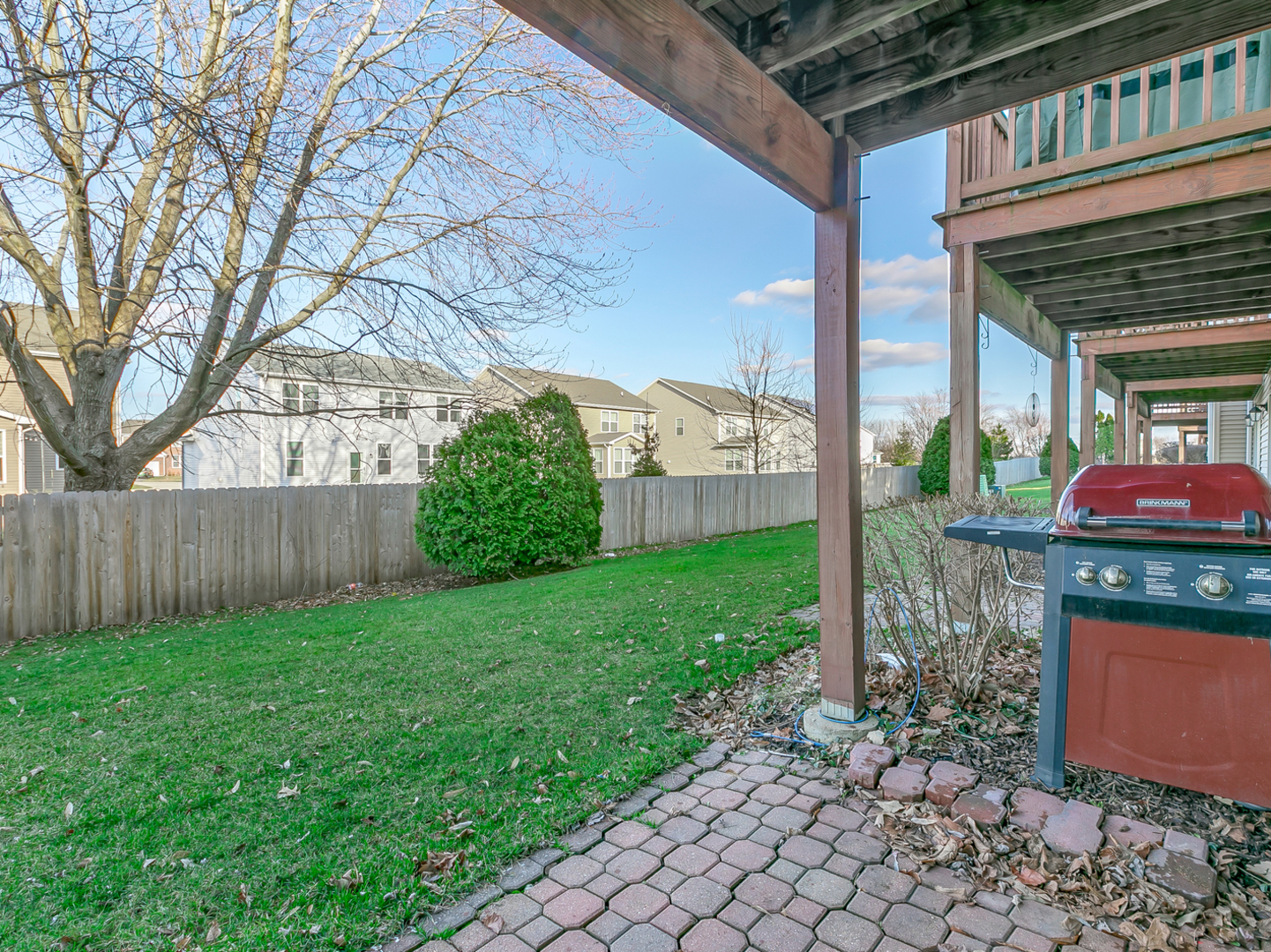 2331 Overlook Court Naperville, IL 60563 - Photo 27 of 27 a view of a backyard with plants and large trees