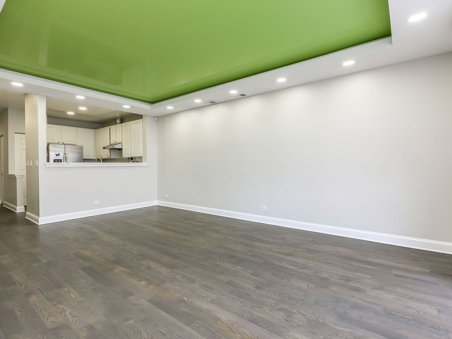 2331 Overlook Court Naperville, IL 60563 - Photo 3 of 27 a view of a kitchen with a fridge and wooden floor