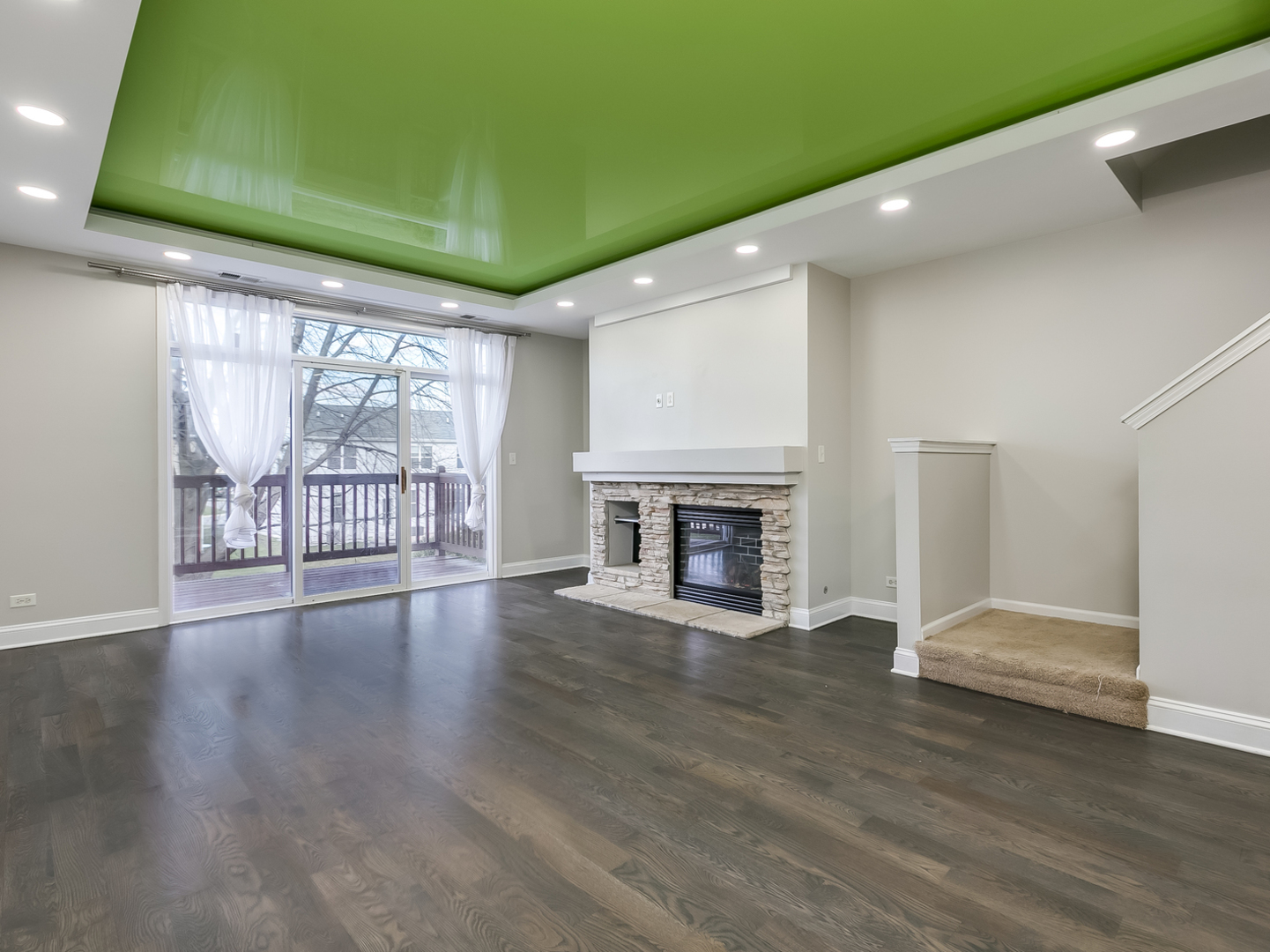 2331 Overlook Court Naperville, IL 60563 - Photo 5 of 27 a view of an empty room with wooden floor and a window