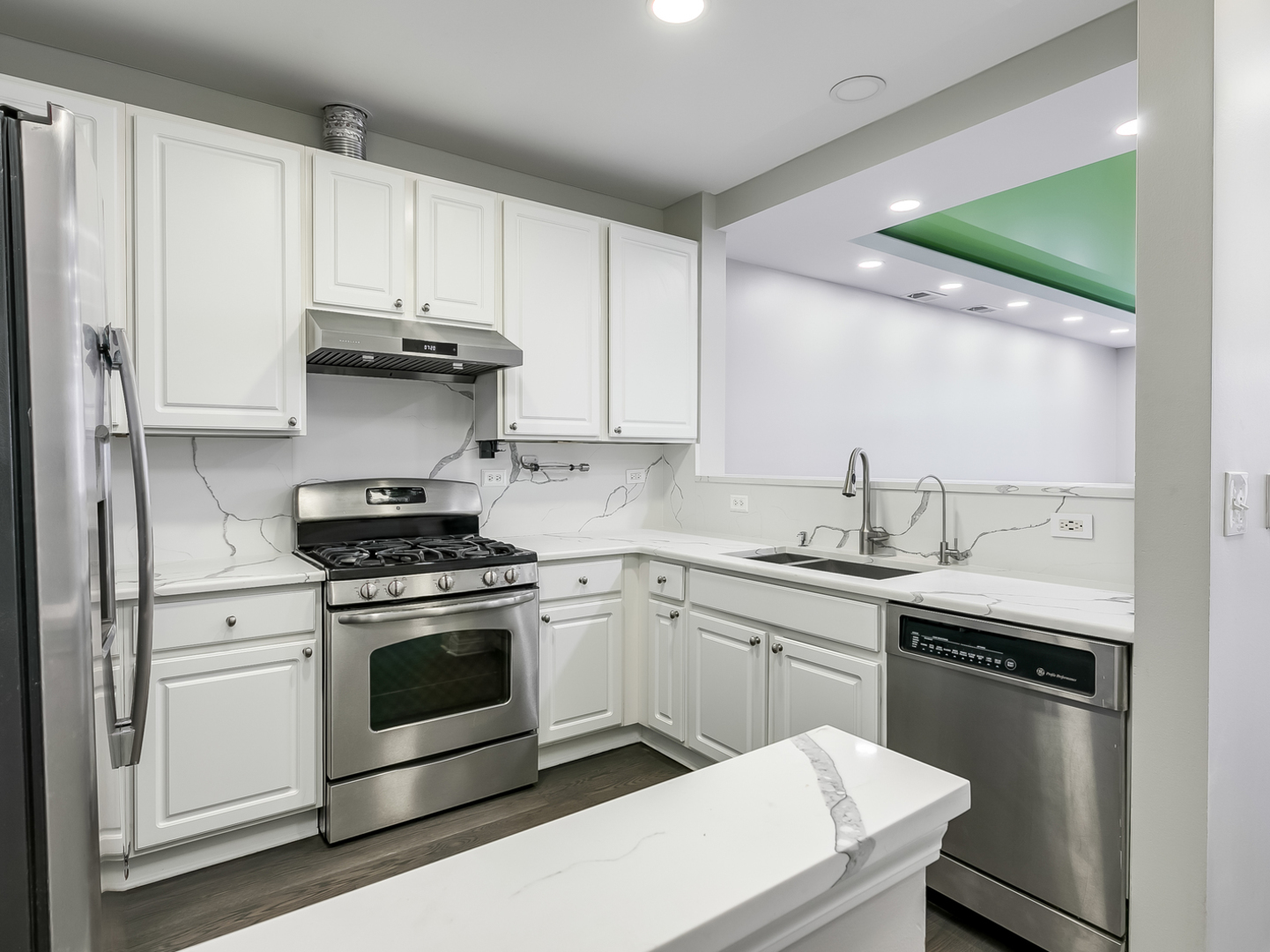2331 Overlook Court Naperville, IL 60563 - Photo 8 of 27 a kitchen with a stove and a sink