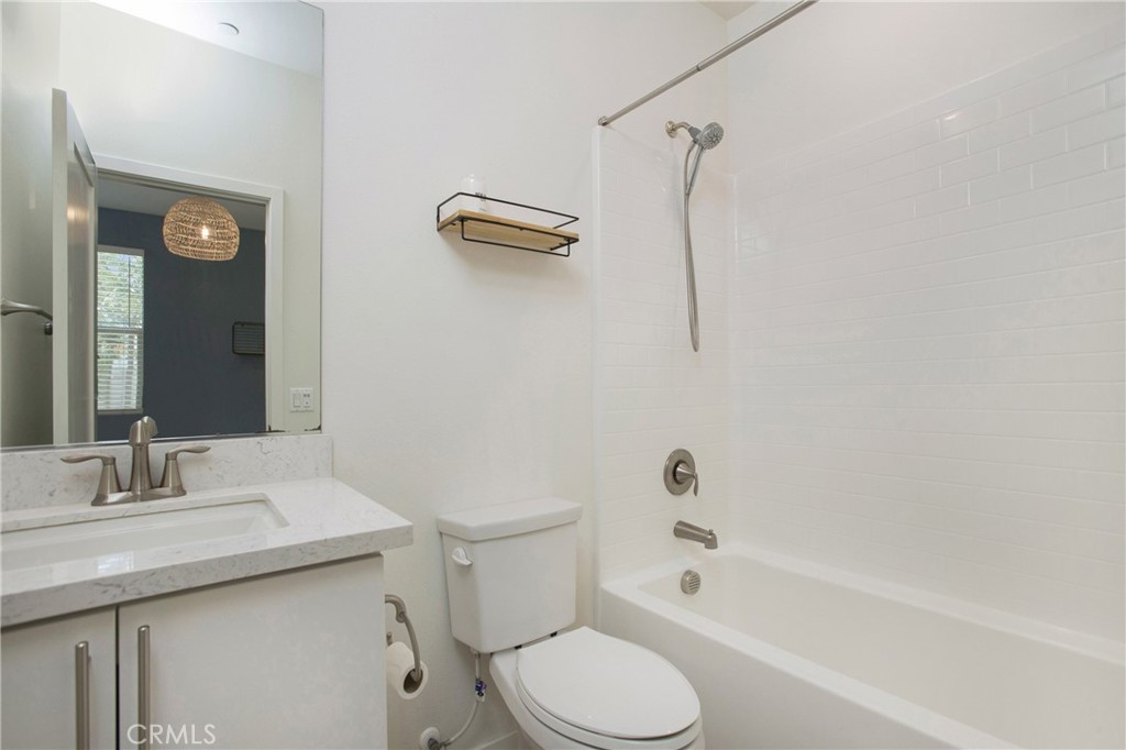 148 Acamar Irvine, CA 92618 - Photo 14 of 23 a bathroom with a sink toilet and shower
