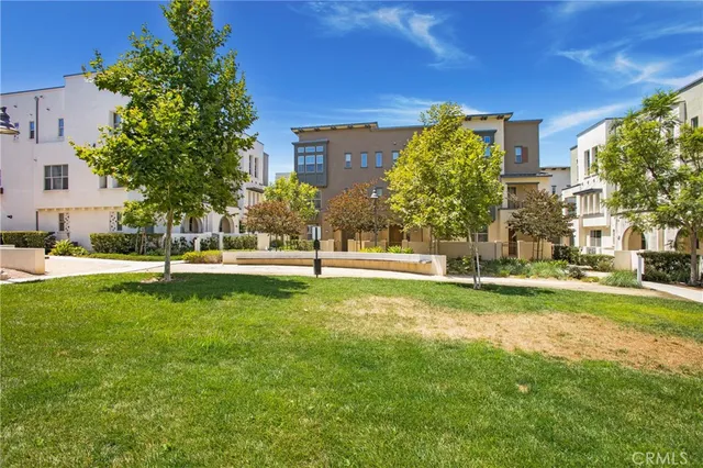 a view of a living room and a floor to ceiling window