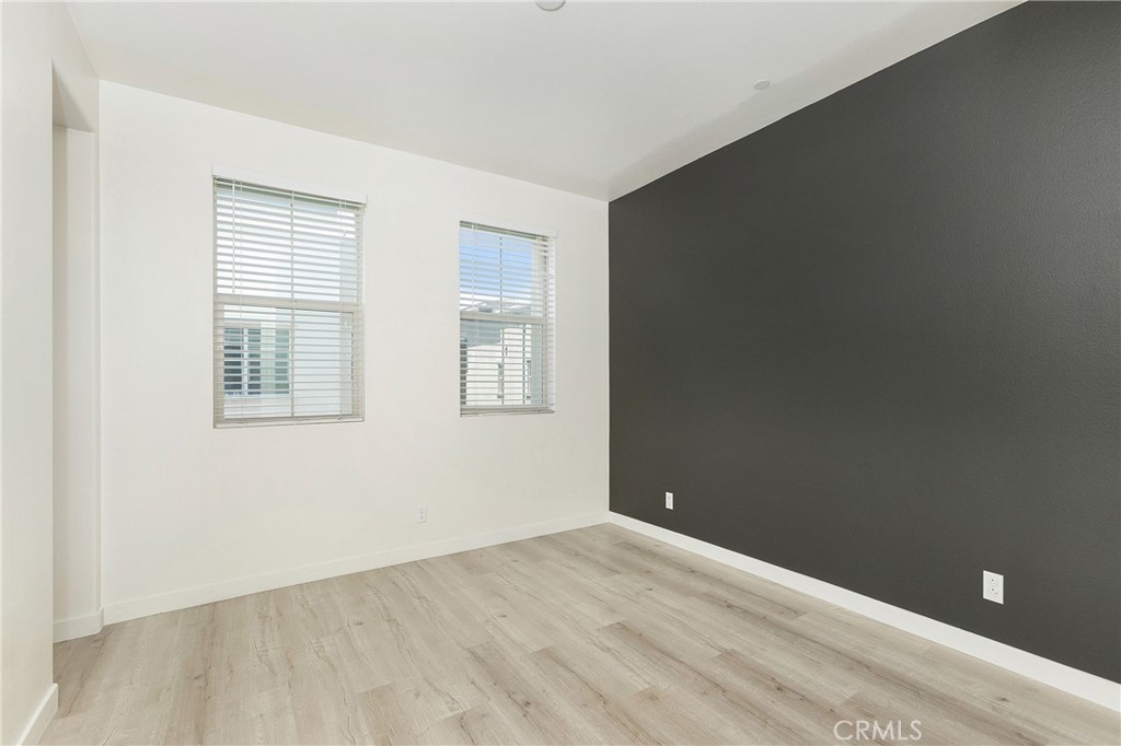 148 Acamar Irvine, CA 92618 - Photo 10 of 23 wooden floor in an empty room with a window