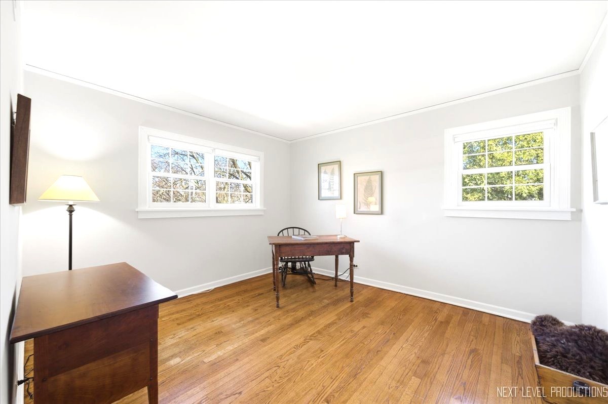 515 3rd Street Wilmette, IL 60091 - Photo 21 of 26 a view of a livingroom with furniture and a window