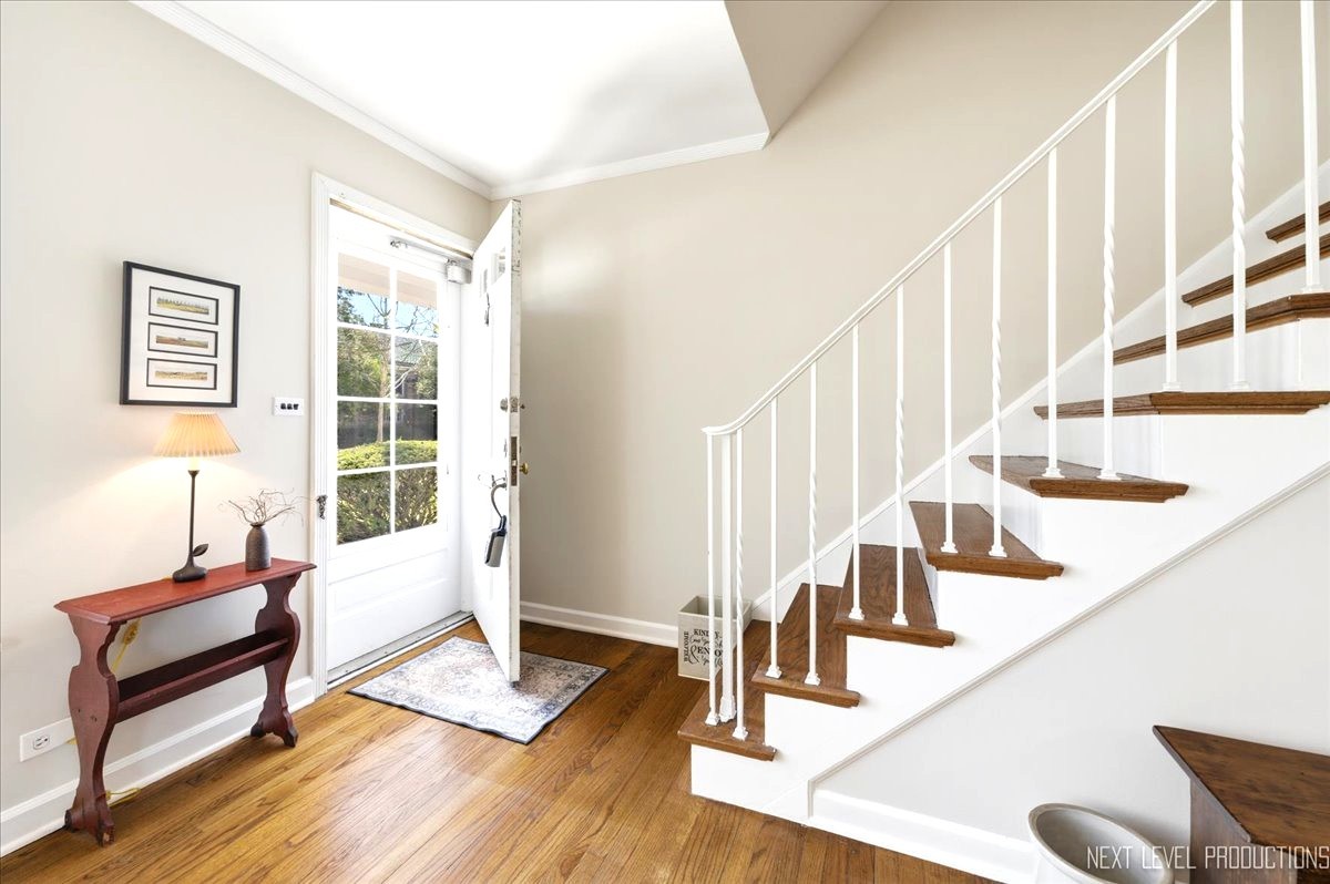 515 3rd Street Wilmette, IL 60091 - Photo 7 of 26 a living room with wooden floor and furniture