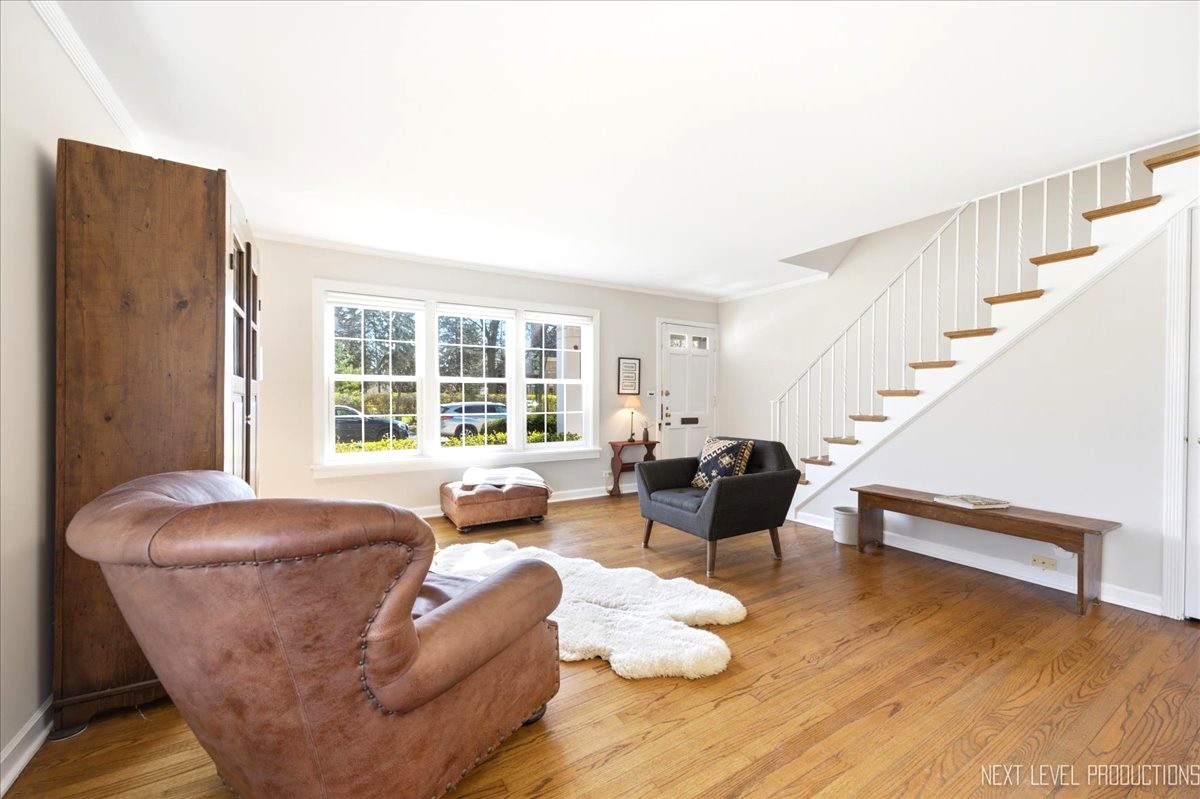 515 3rd Street Wilmette, IL 60091 - Photo 8 of 26 a living room with furniture and a large window