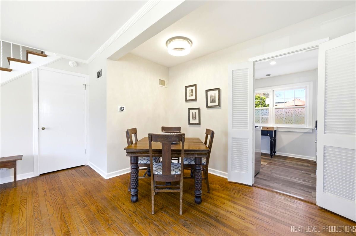 515 3rd Street Wilmette, IL 60091 - Photo 9 of 26 a view of a dining room with furniture and wooden floor
