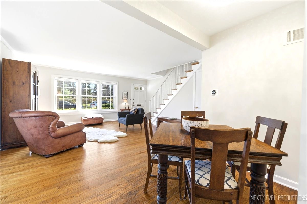 515 3rd Street Wilmette, IL 60091 - Photo 10 of 26 a living room with furniture and a large window
