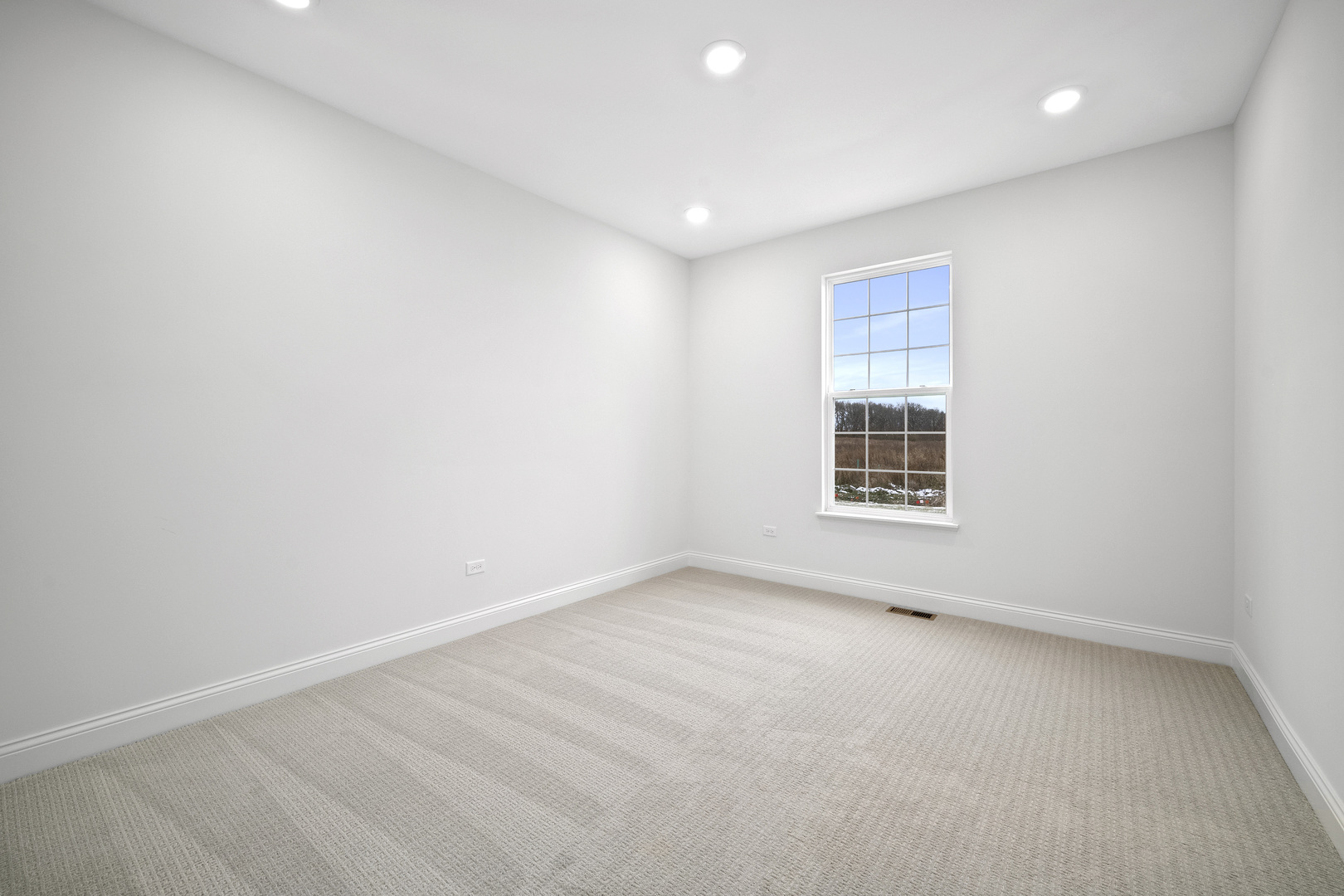 3657 Edelweiss Road Elgin, IL 60124 - Photo 8 of 24 an empty room with windows