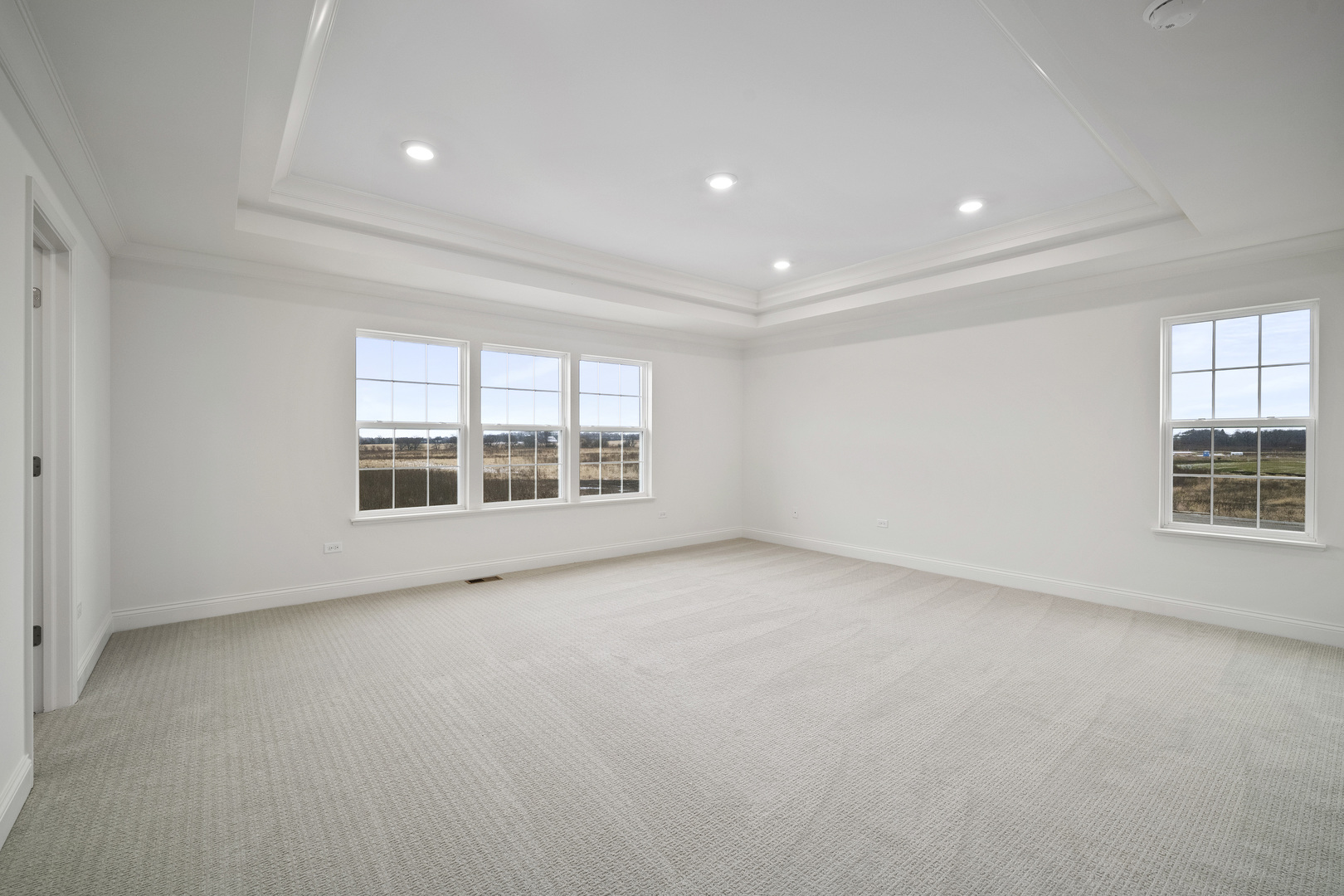3657 Edelweiss Road Elgin, IL 60124 - Photo 10 of 24 an empty room with windows