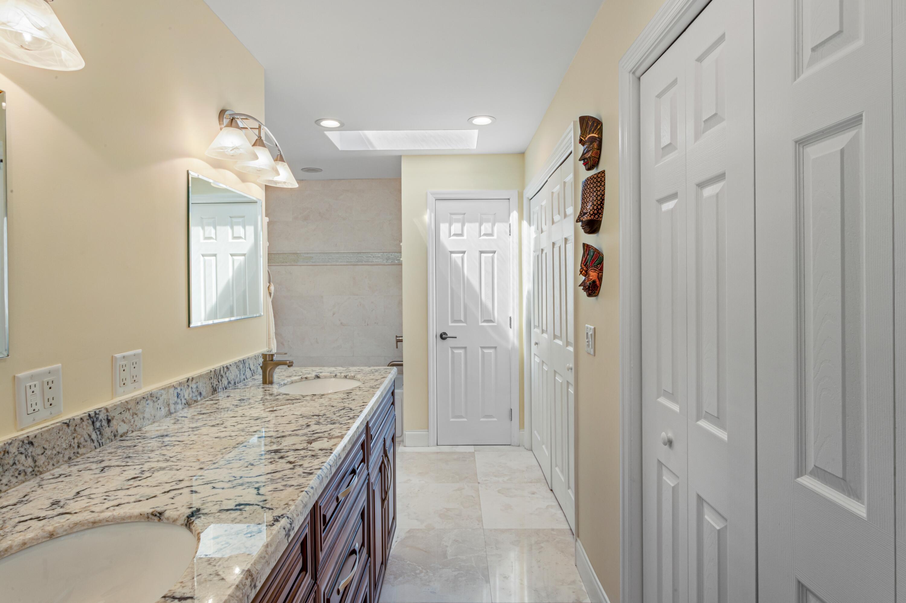 414 Beach Curve Road Lantana, FL 33462 - Photo 12 of 28 mls_PRIMARY_BATHROOM_STRAIGHT