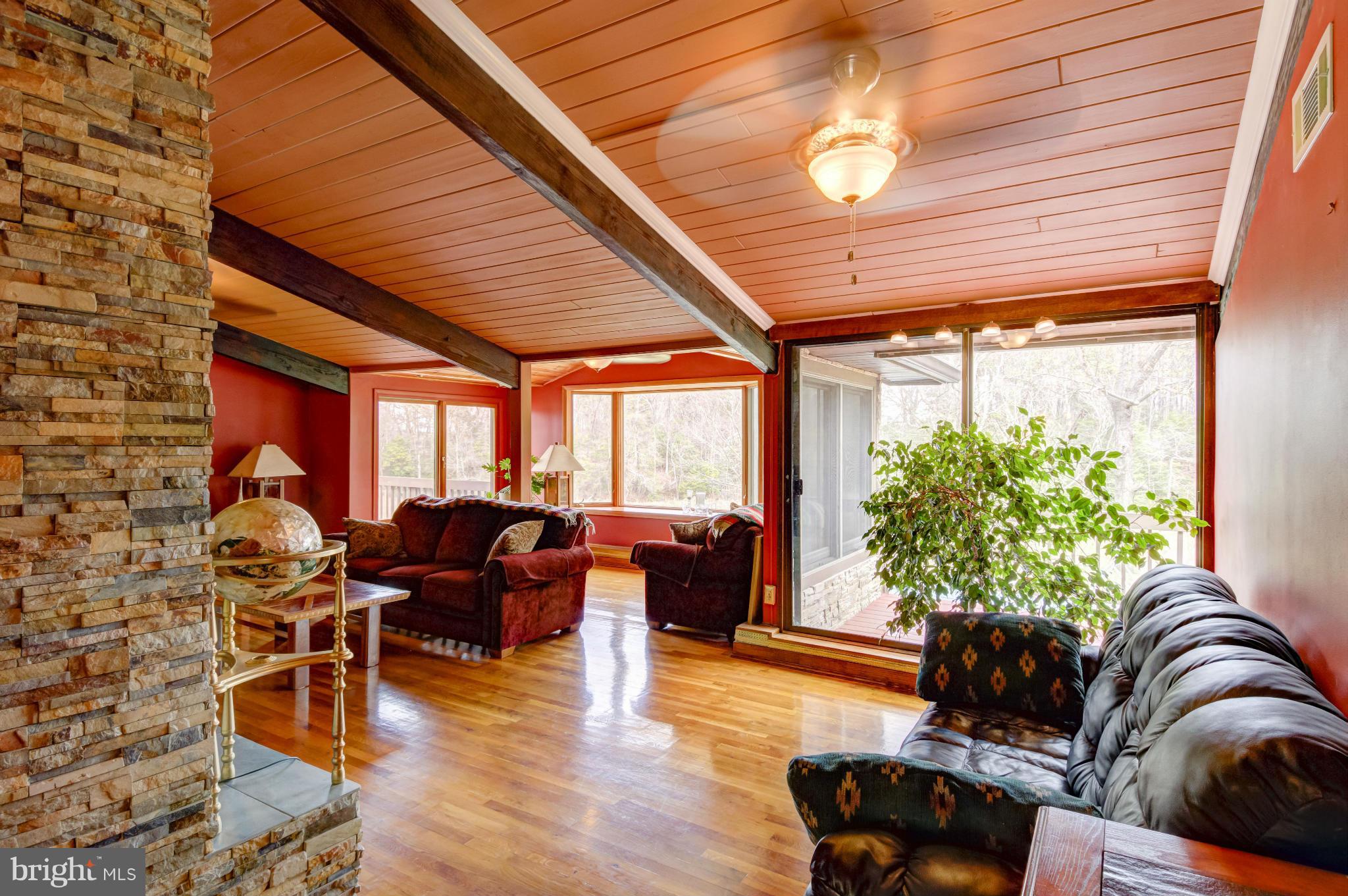 3381 Carroll Road Huntingtown, MD 20639 - Photo 5 of 30 a living room with furniture and a large window