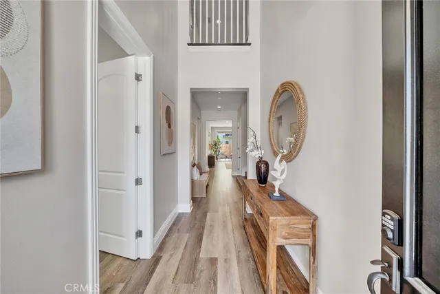 a living room with furniture or couch and a wooden floor