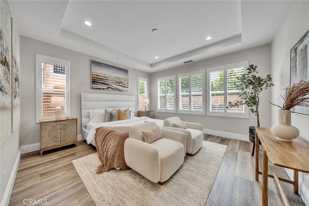 61 Windwalker Way Tustin, CA 92782 - Photo 24 of 62 a bed room with furniture and a large window