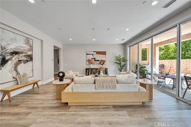 a bedroom with a bed and a table in it