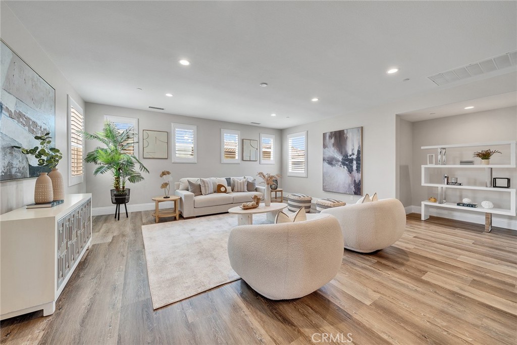 61 Windwalker Way Tustin, CA 92782 - Photo 34 of 62 a living room with furniture and a large window