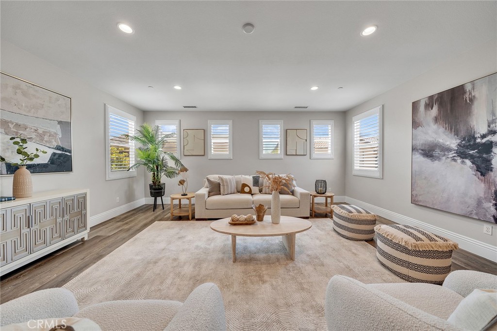 61 Windwalker Way Tustin, CA 92782 - Photo 35 of 62 a living room with furniture and a window