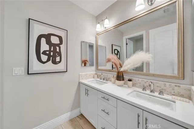 a view of a patio with a table and chairs