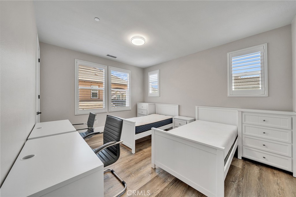 61 Windwalker Way Tustin, CA 92782 - Photo 44 of 62 a view of a workspace with furniture and a window