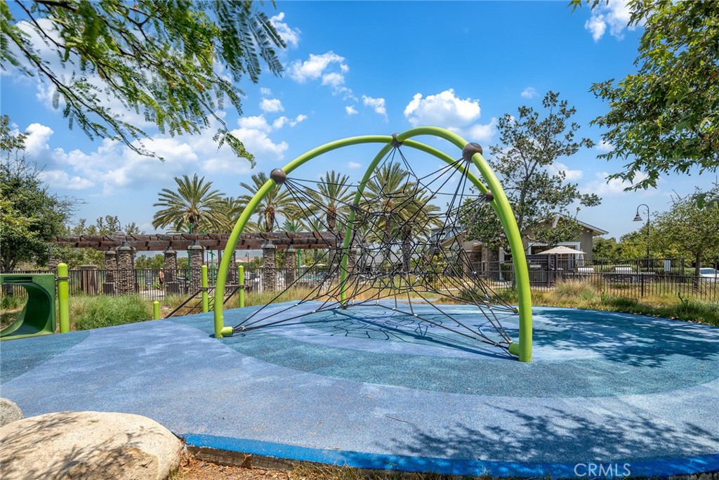 61 Windwalker Way Tustin, CA 92782 - Photo 50 of 62 a view of swimming pool with sitting area and slide
