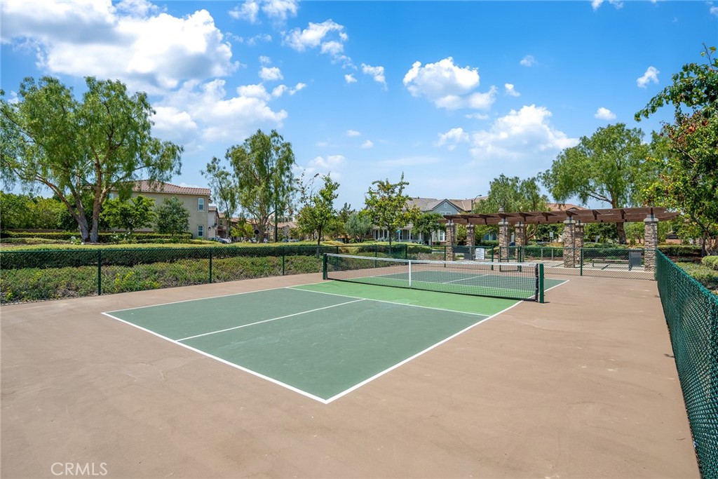 61 Windwalker Way Tustin, CA 92782 - Photo 53 of 62 a view of a playground and basketball court