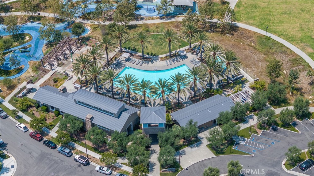 61 Windwalker Way Tustin, CA 92782 - Photo 57 of 62 an aerial view of a house with a garden and lake view
