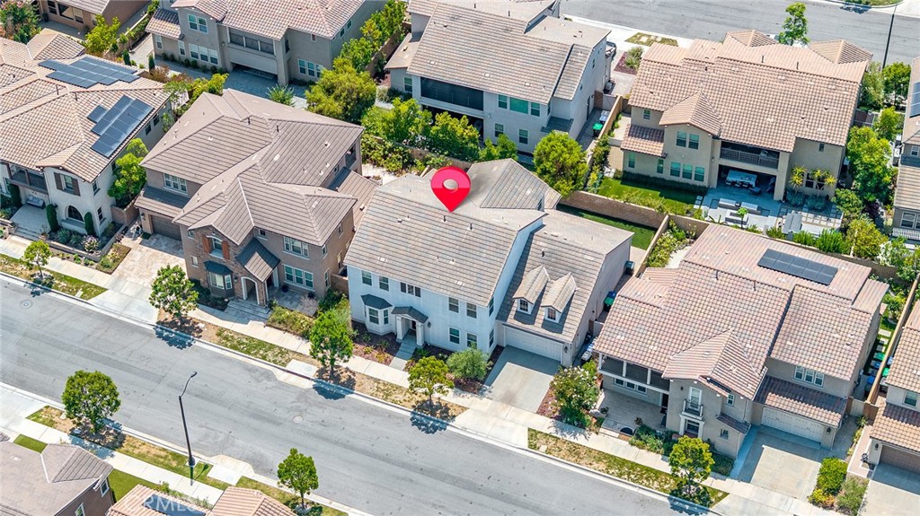 61 Windwalker Way Tustin, CA 92782 - Photo 61 of 62 an aerial view of multiple houses with yard