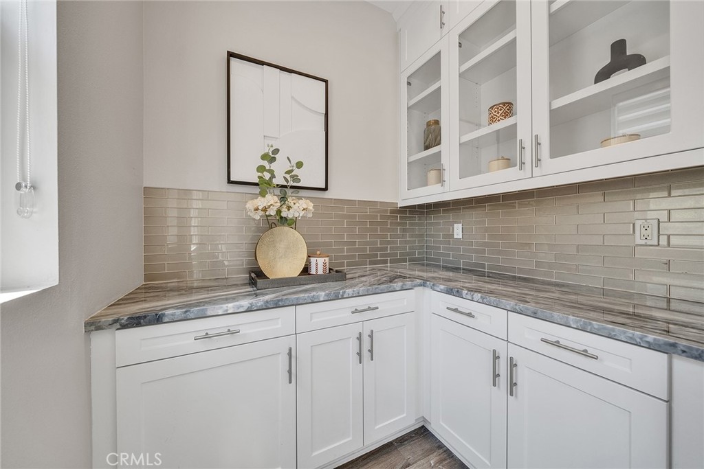 61 Windwalker Way Tustin, CA 92782 - Photo 9 of 62 a bathroom with a sink and a mirror