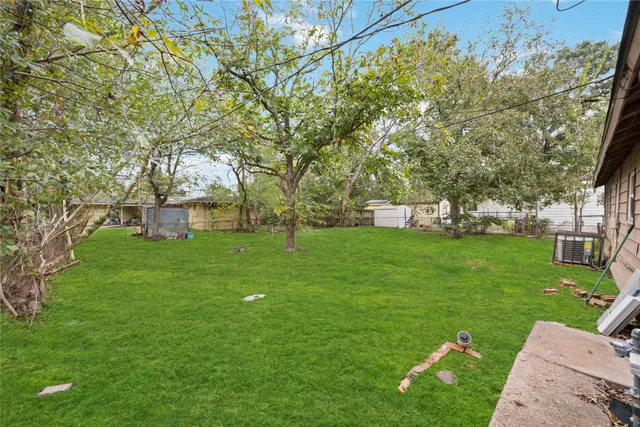 a view of a house with a big yard