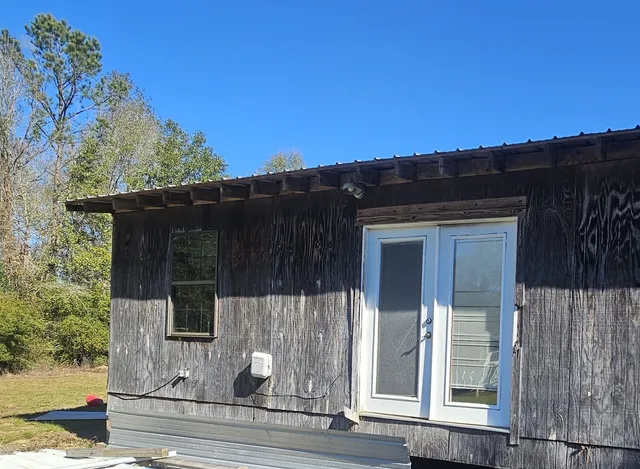 a front view of house with yard