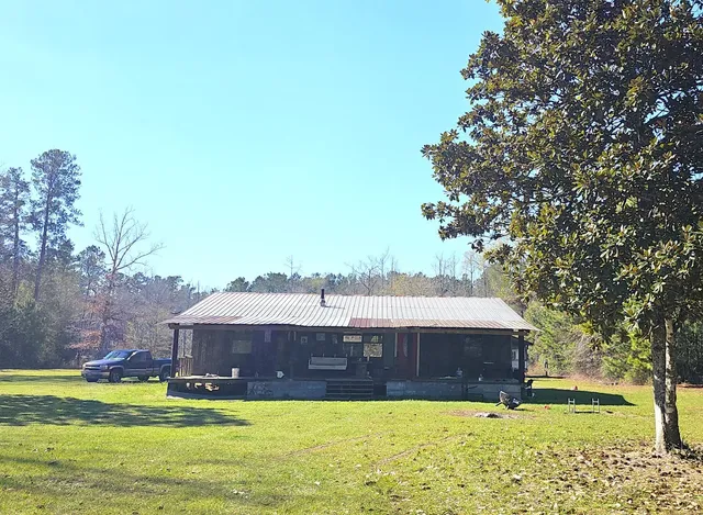 a aerial view of a house with a big yard