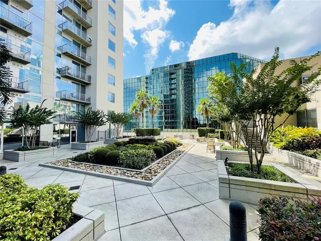 a view of a hall with wooden floor