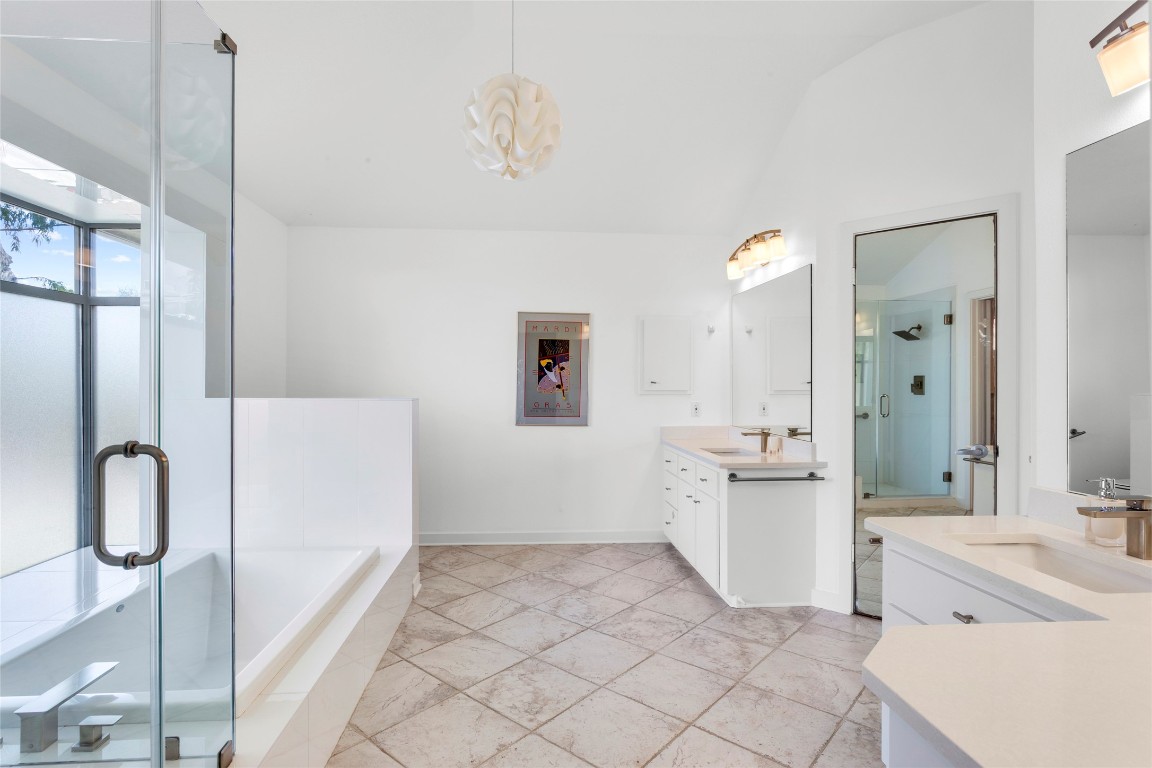 67 Harbor Lane Kemah, TX 77565 - Photo 17 of 47 a bathroom with a bathtub sink and mirror