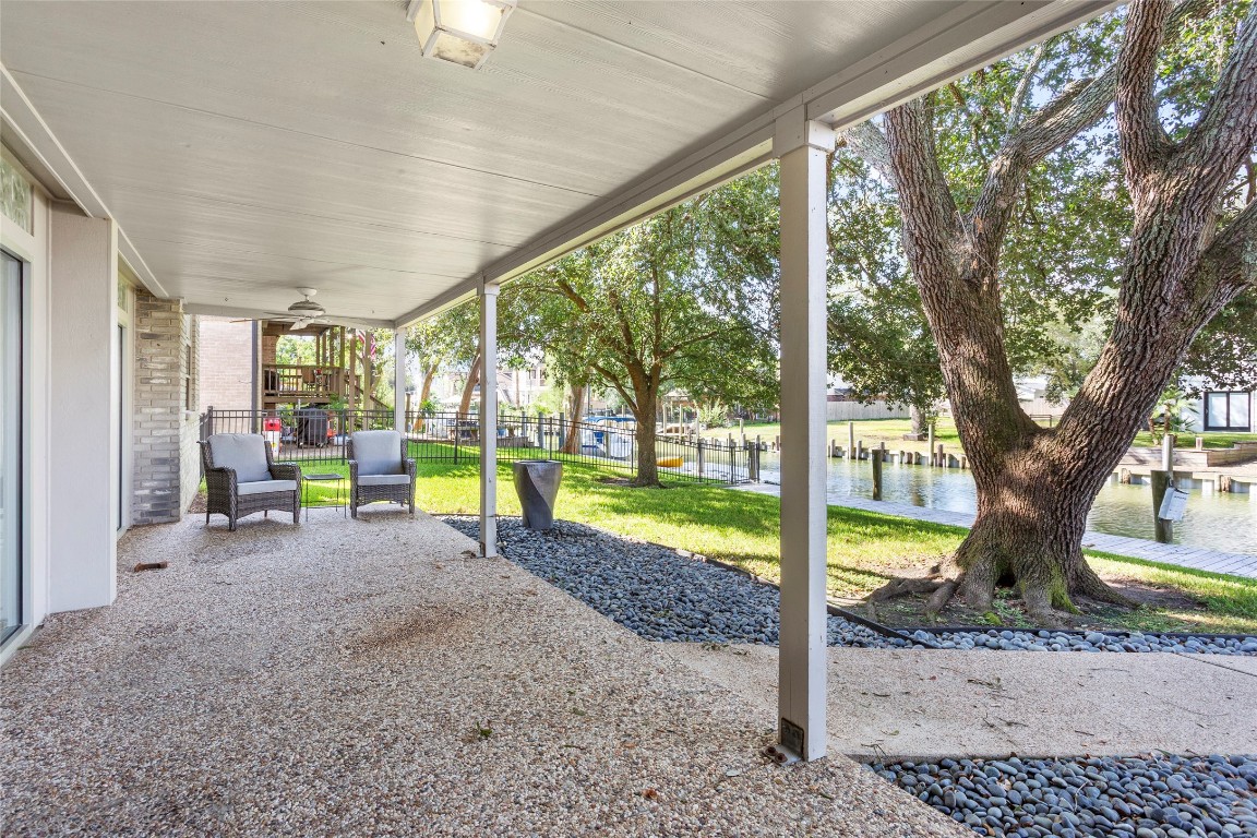 67 Harbor Lane Kemah, TX 77565 - Photo 35 of 47 a view of a house with backyard porch and sitting area