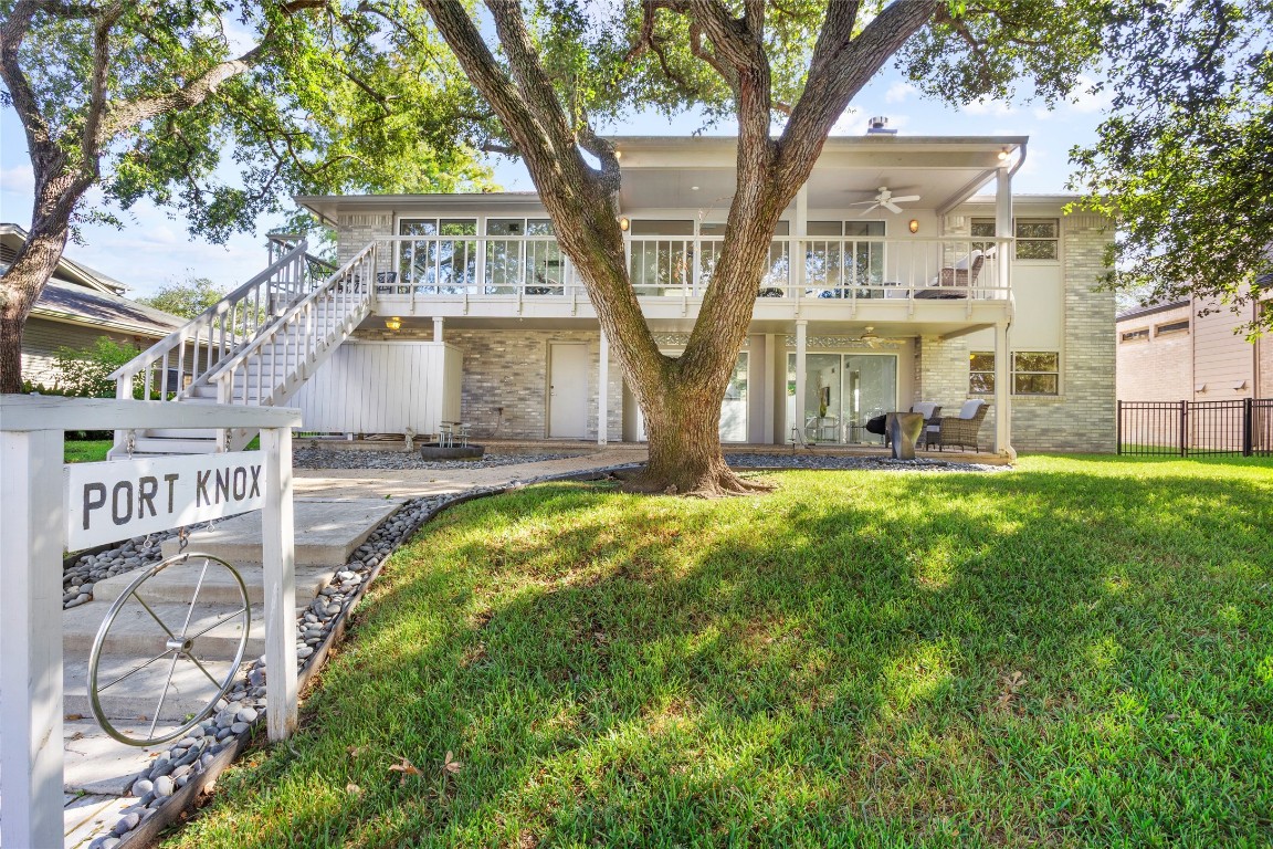 67 Harbor Lane Kemah, TX 77565 - Photo 38 of 47 a front view of a house with a yard