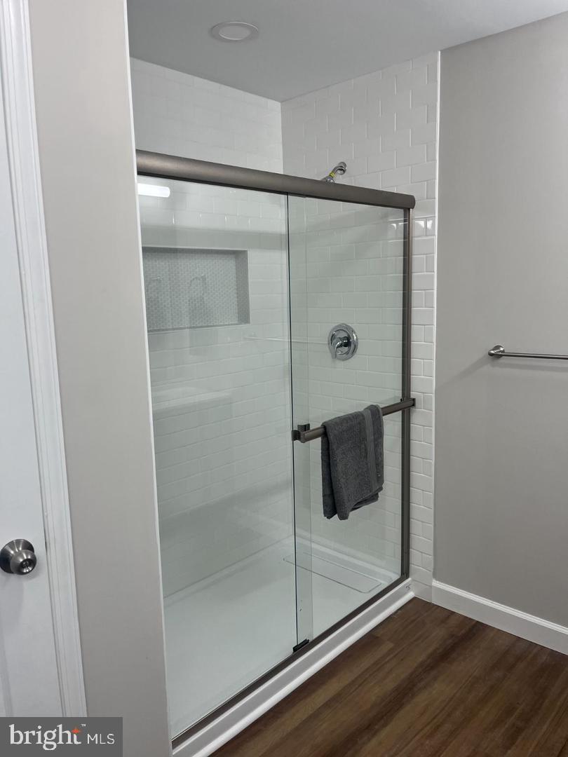 28542 Raccoon Ford Road Culpeper, VA 22701 - Photo 17 of 31 Sleek modern primary bathroom.