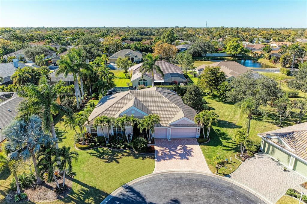 an aerial view of a house with a garden