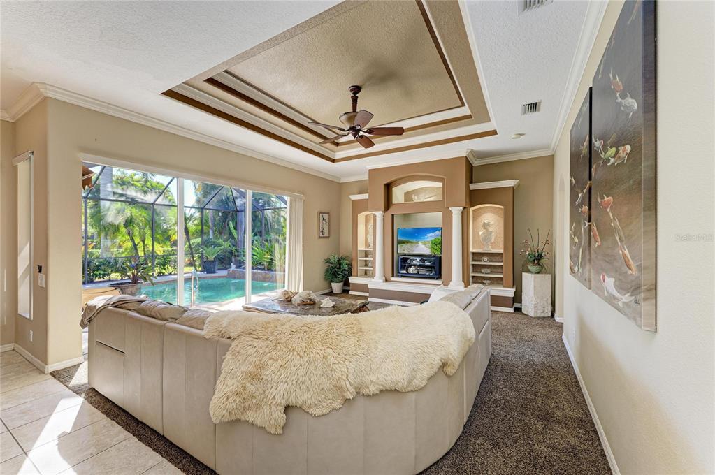 5060 Robinsong Road Sarasota, FL 34233 - Photo 19 of 42 a living room with furniture and a large window