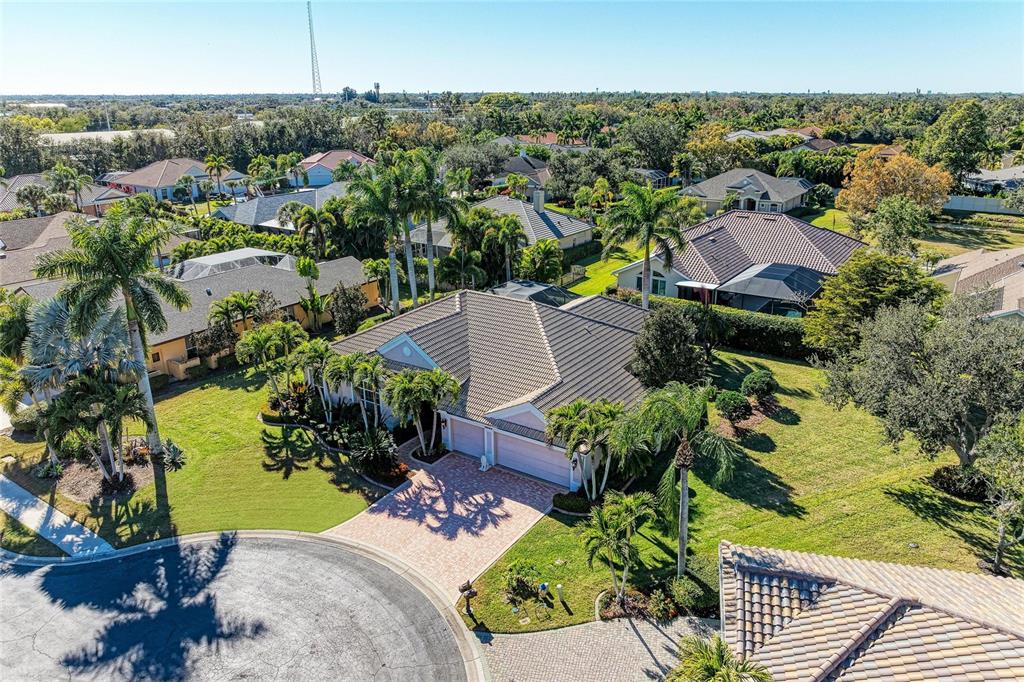 5060 Robinsong Road Sarasota, FL 34233 - Photo 4 of 42 an aerial view of a house with a garden