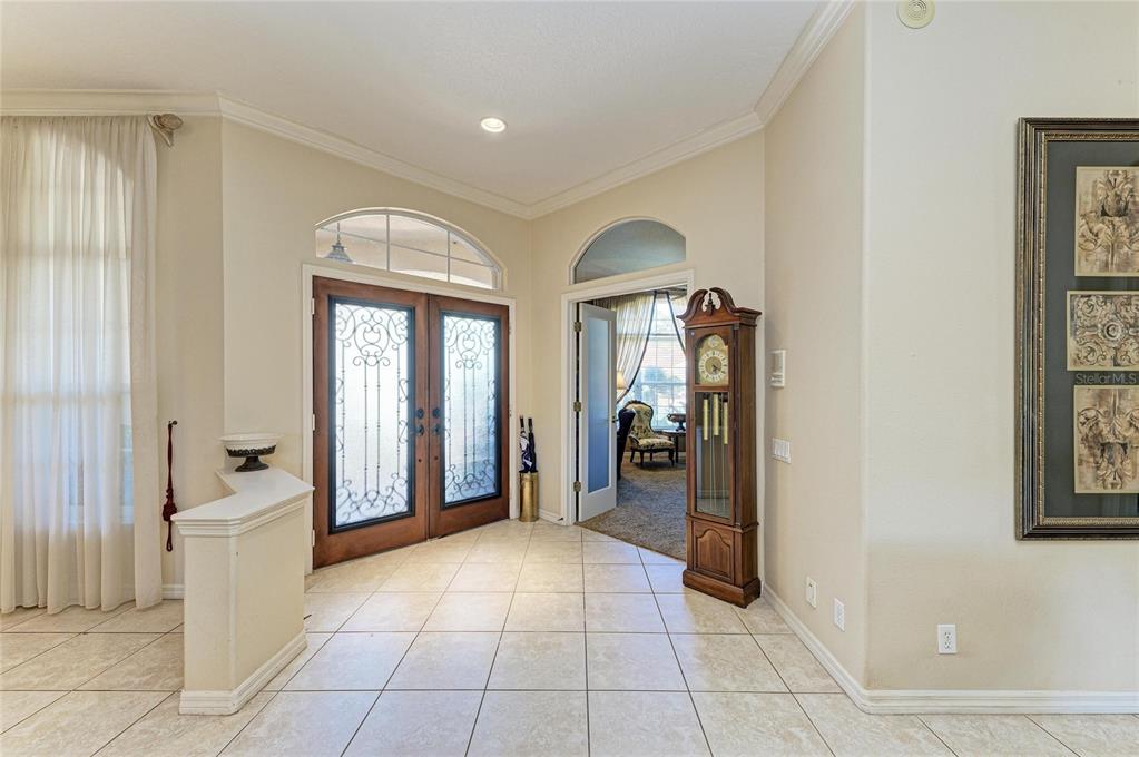 5060 Robinsong Road Sarasota, FL 34233 - Photo 10 of 42 a view of a room with windows and wardrobe