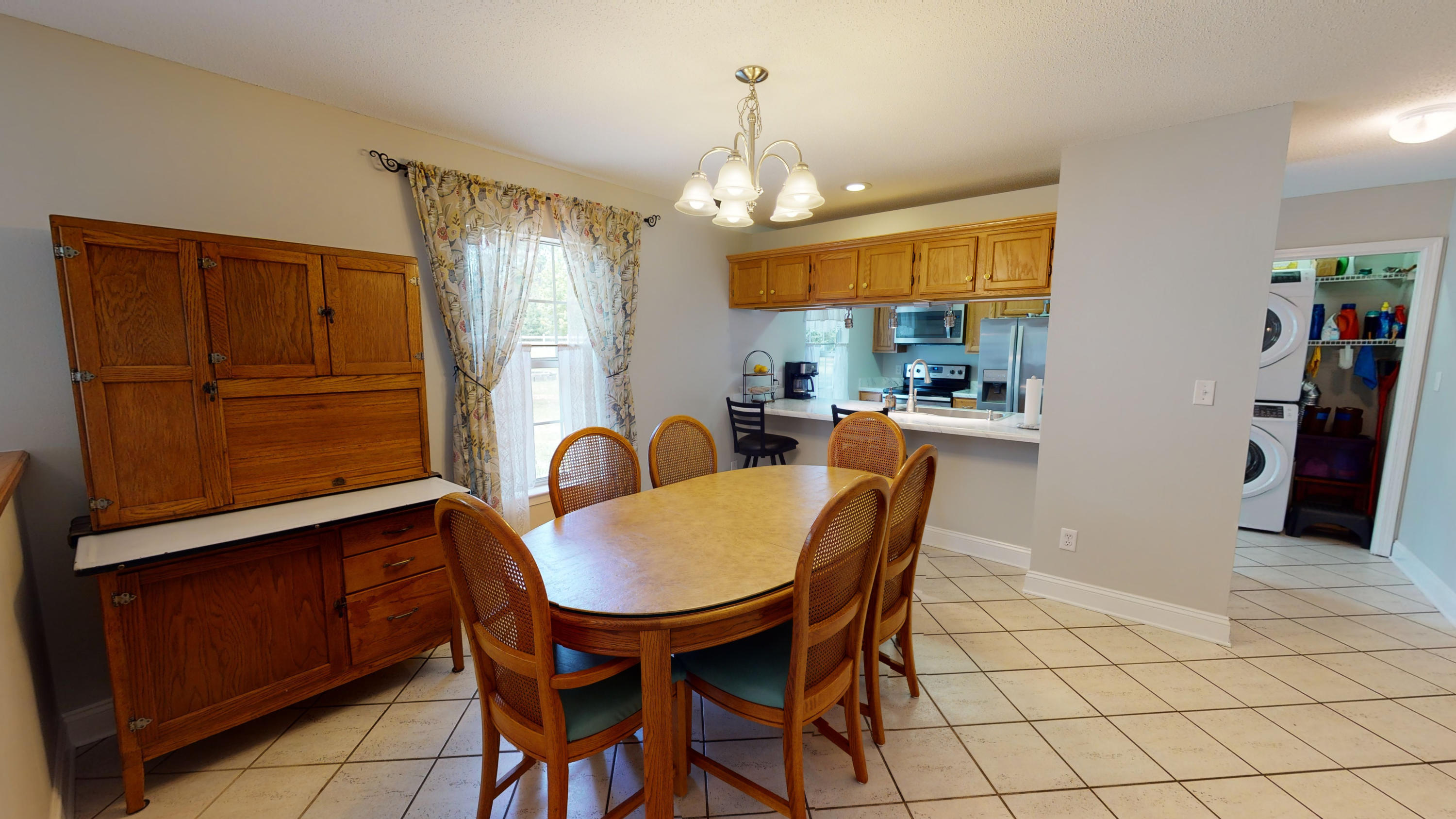 5809 Flamingo Road Crestview, FL 32539 - Photo 4 of 48 a dining room with furniture and window