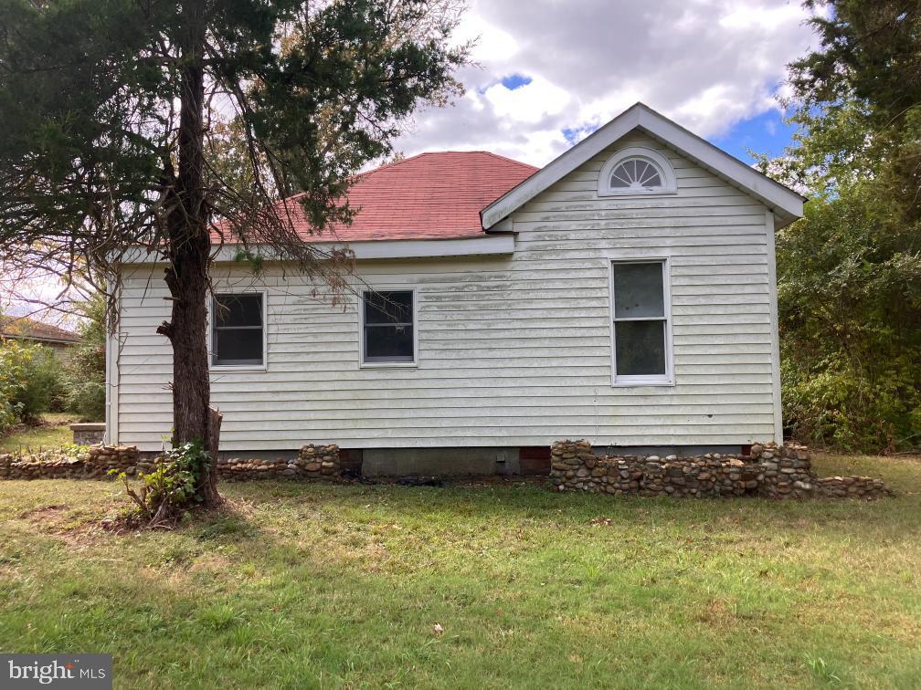 4805 Bicknell Road Marbury, MD 20658 - Photo 9 of 10 Charming cottage nestled in lush greenery.