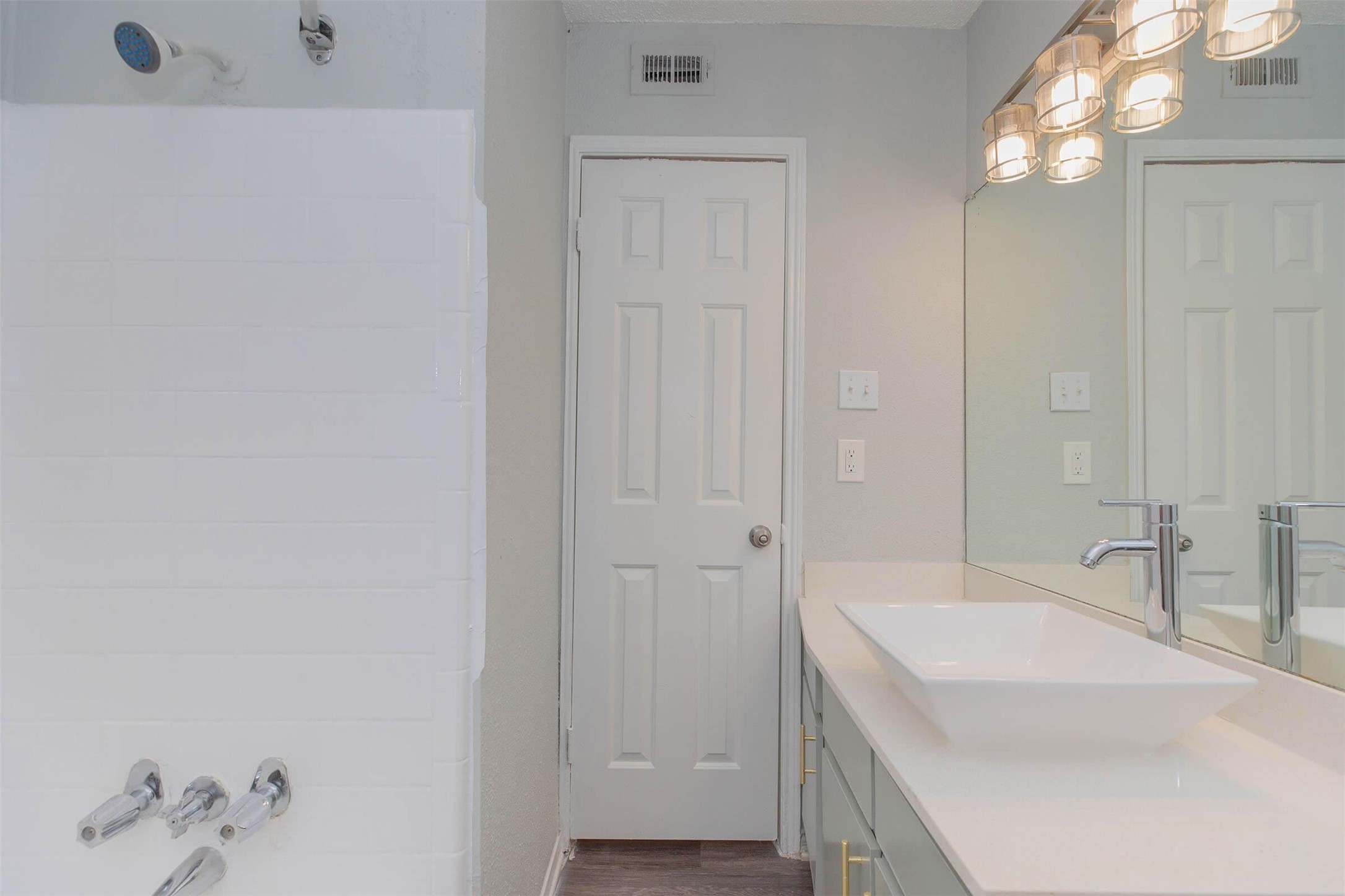 3001 Hillcroft Street, Unit G1208 Houston, TX 77057 - Photo 13 of 50 a bathroom with a sink and a mirror