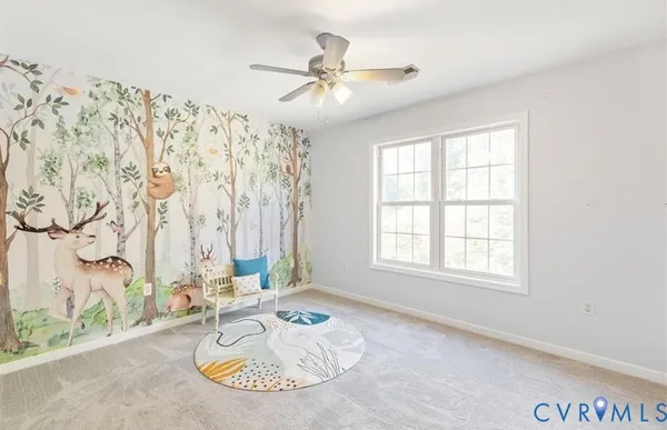 a view of a livingroom with furniture window and outside view