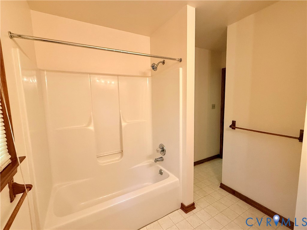 2590 Davis Mill Road Goochland, VA 23063 - Photo 21 of 33 a bathroom with a bathtub a shower and a shower