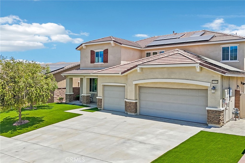 11056 Guffey Ranch Way Corona, CA 92883 - Photo 1 of 61 front view of house with a yard