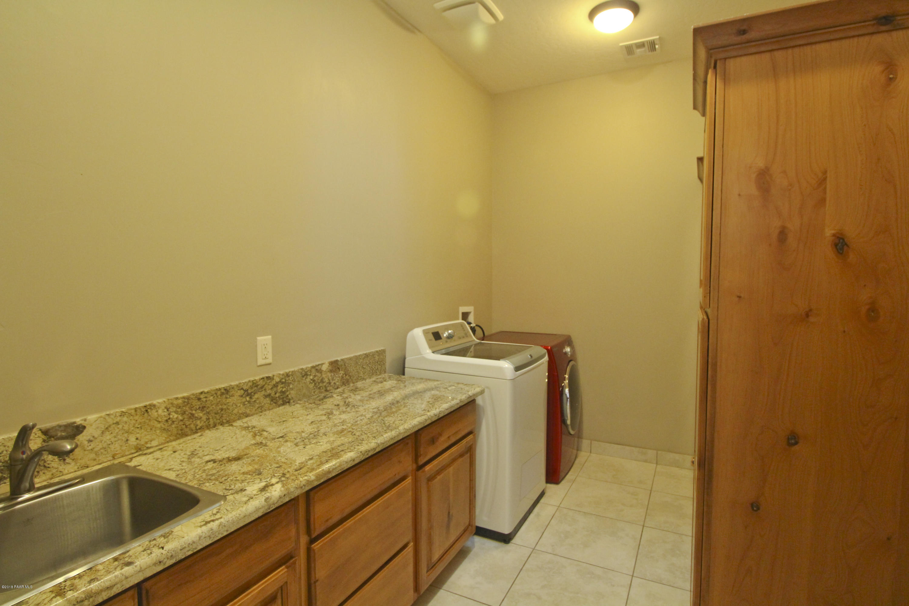 4800 West Mint Creek Road Prescott, AZ 86305 - Photo 21 of 62 a utility room with a sink